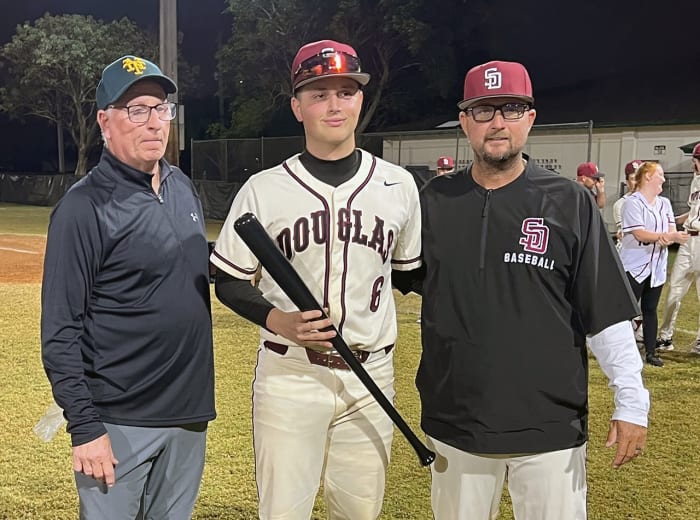 Niko Benestad (center) was named MVP photo BCAA Tournament. He posed with Pat McQuaid (left) and Stoneman Douglas head coach Todd Fitz-Gerald. (3/1/2024)